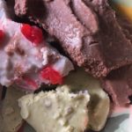 Homemade spumoni ice cream made of cherry, chocolate, and pistachio flavors.