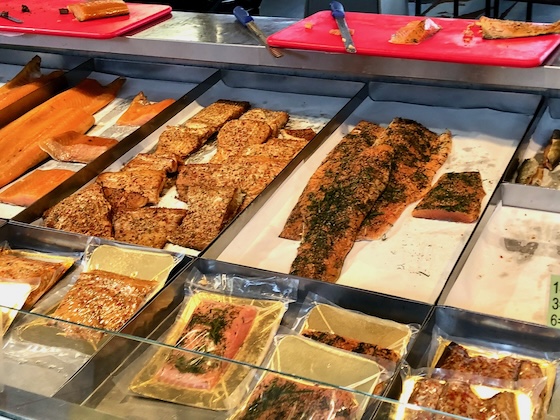 Fresh salmon like this in Bergen fish market could be used for a baked fish and chips recipe.