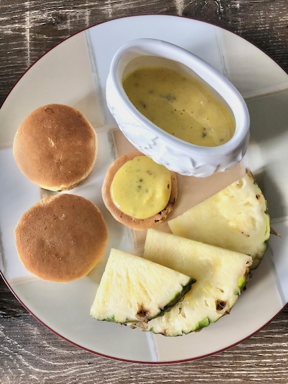 silver dollar pancakes with pineapple anise anglaise.