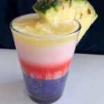 Pina colada tropical smoothie layered drink as a way to enjoy low-fat desserts.