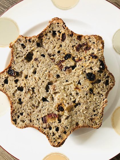 Banana walnut bread cut in half.