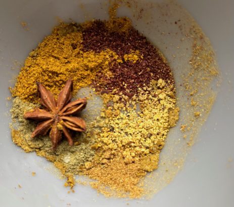 Turmeric orange stands out... and how does turmeric taste? It brings a smokey flavor to a spice blend good for meat rubs.