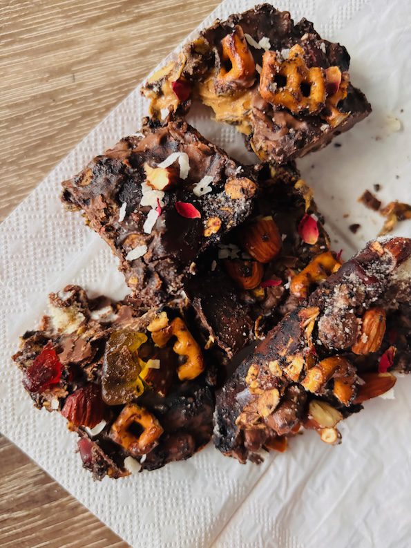 Rocky road bar broken into smaller pieces for a trail mix.