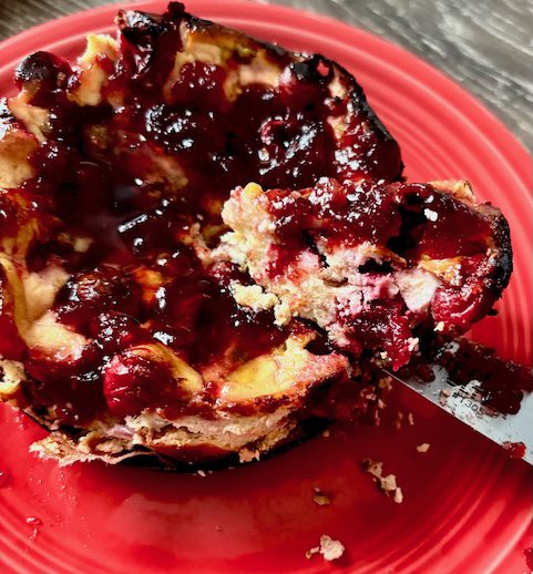 sheep's cheese cake bite on a plate.