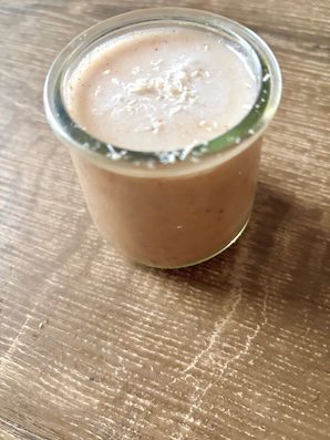 pear strawberry smoothie blend in a glass.