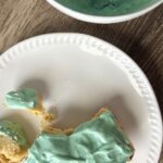 blue frosting on cake.