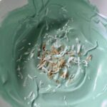 protein smoothie bowl with healthy yogurt blue spirulina and matcha collagen powders.