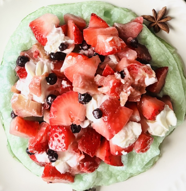 berry pavlova fruit with fresh late spring or early summer fruits. 