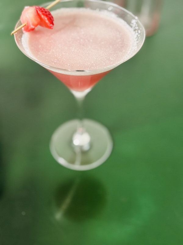 Dirty soda that's put in a elevated celebrational glass.