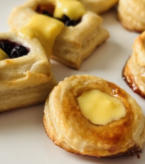 rough puff pastry bite layers with low-sugar lemon curd and blueberries.