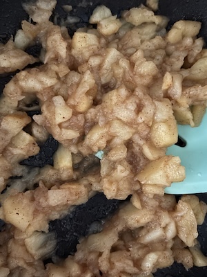 cooked apples for apple cheesecake.